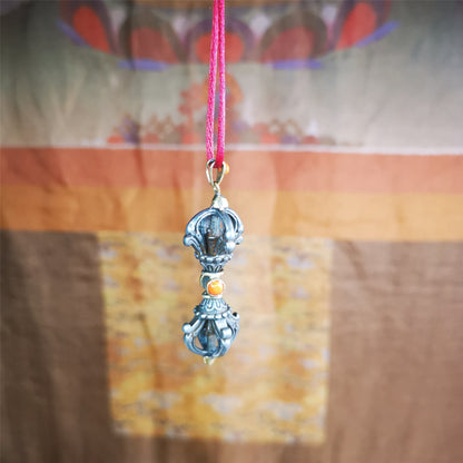 This unique vajra pendant was handmade by Tibetan craftsmen from Tibet in 1990's,from Hepo Town, Baiyu County, the birthplace of the famous Tibetan handicrafts. It is five-pronged Vajra,made of cold iron, 1.77 inch height.Comes with leather cord. You can make it a necklace, pendant, keychain, mala pendant, or just as an ornament on your desk.