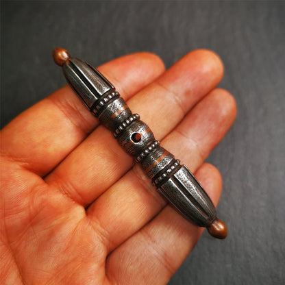 This unique vajra pendant was handmade by Tibetan craftsmen from Tibet in 1990s,from Hepo Town, Baiyu County, the birthplace of the famous Tibetan handicrafts. It is nine-pronged Vajra,made of cold iron,inlaid copper wire, 3.22 inches length.
