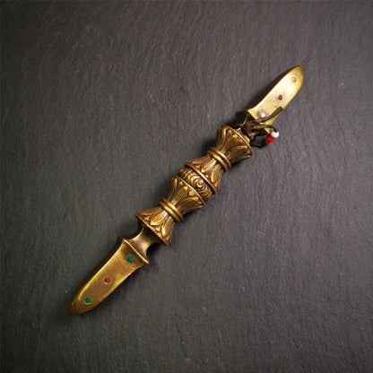 These beautiful vajra were handmade by Tibetan craftsmen from Tibet in 1990s,from Hepo Town, Baiyu County, the birthplace of the famous Tibetan handicrafts. It is five-pronged vajra,made of brass,inlaid agate,yellow color,6.5 inches length.