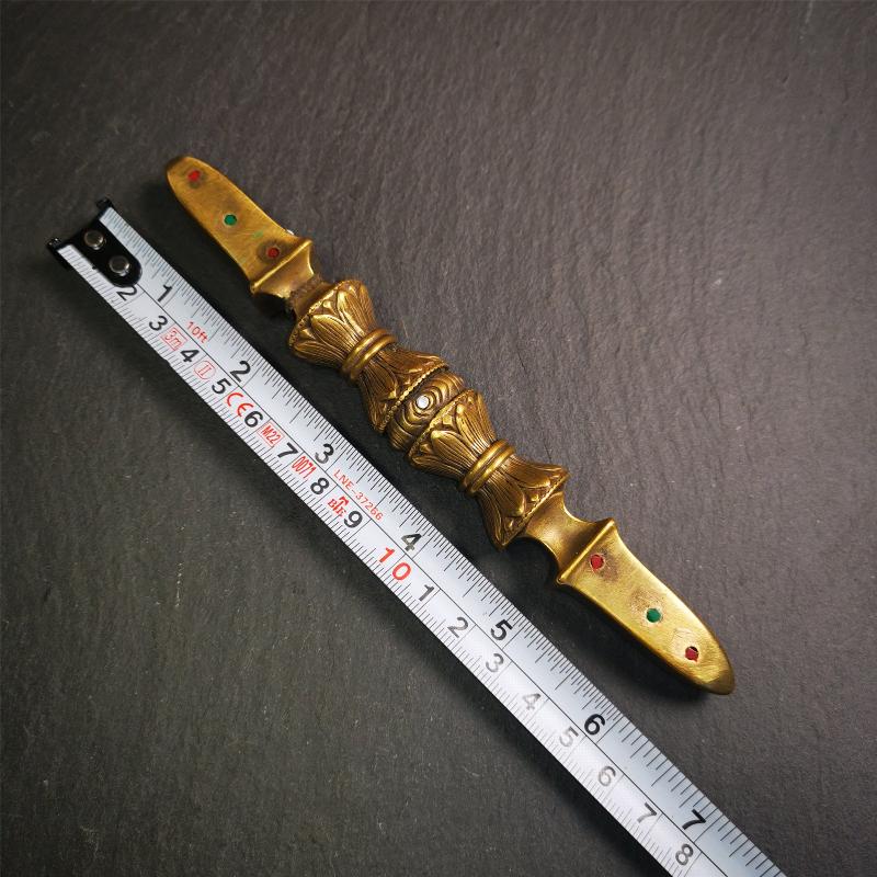 These beautiful vajra were handmade by Tibetan craftsmen from Tibet in 1990s,from Hepo Town, Baiyu County, the birthplace of the famous Tibetan handicrafts. It is five-pronged vajra,made of brass,inlaid agate,yellow color,6.5 inches length.