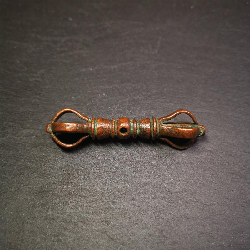 This unique vajra pendant was handmade by Tibetan craftsmen from Tibet in 1990s,from Hepo Town, Baiyu County, the birthplace of the famous Tibetan handicrafts. It is five-pronged Vajra,made of copper, brown color,2.76 inches length.