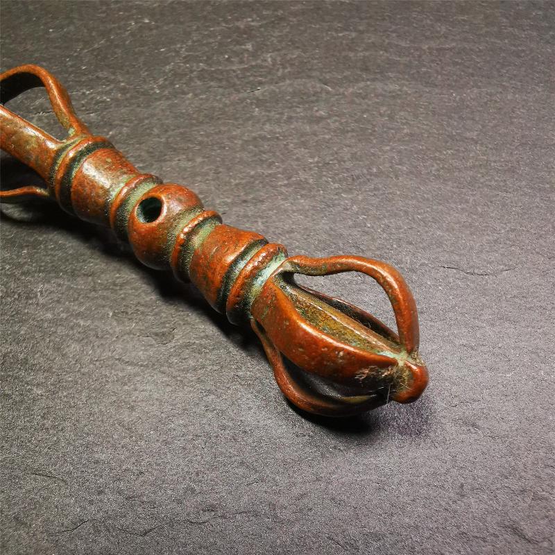 This unique vajra pendant was handmade by Tibetan craftsmen from Tibet in 1990s,from Hepo Town, Baiyu County, the birthplace of the famous Tibetan handicrafts. It is five-pronged Vajra,made of copper, brown color,2.76 inches length.