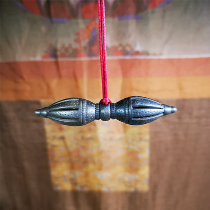 These beautiful vajra were handmade by Tibetan craftsmen from Tibet in 1990's,from Hepo Town, Baiyu County, the birthplace of the famous Tibetan handicrafts. It is nine-pronged vajra,made of cold iron,3.07 inches length.  You can make it a necklace, pendant, keychain, mala pendant, or put in your shrine.