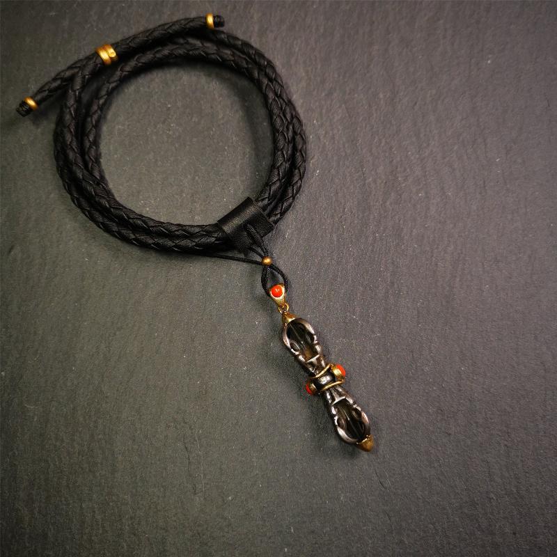 This unique vajra pendant was handmade by Tibetan craftsmen from Tibet in 1990's,from Hepo Town, Baiyu County, the birthplace of the famous Tibetan handicrafts. It is five-pronged Vajra,made of cold iron, 1.77 inch height.Comes with leather cord. You can make it a necklace, pendant, keychain, mala pendant, or just as an ornament on your desk.