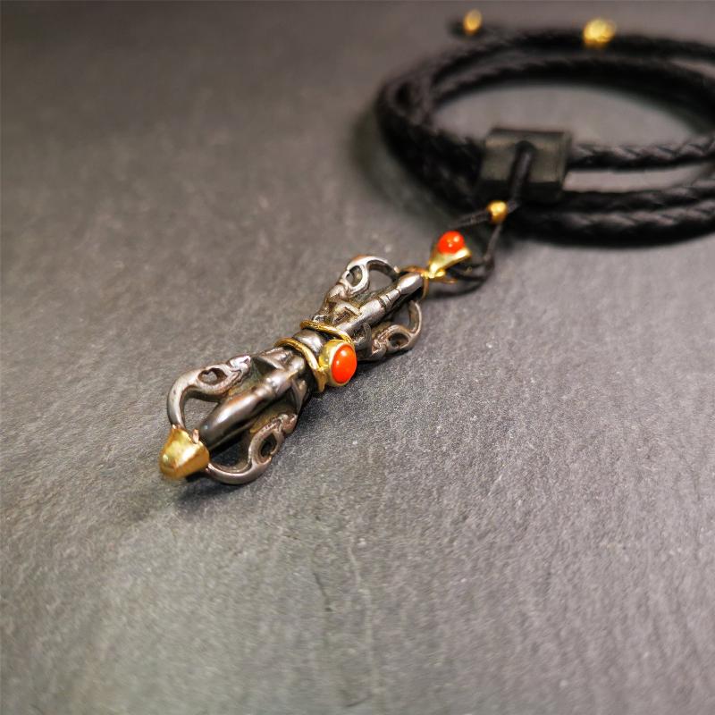 This unique vajra pendant was handmade by Tibetan craftsmen from Tibet in 1990's,from Hepo Town, Baiyu County, the birthplace of the famous Tibetan handicrafts. It is five-pronged Vajra,made of cold iron, 1.77 inch height.Comes with leather cord. You can make it a necklace, pendant, keychain, mala pendant, or just as an ornament on your desk.