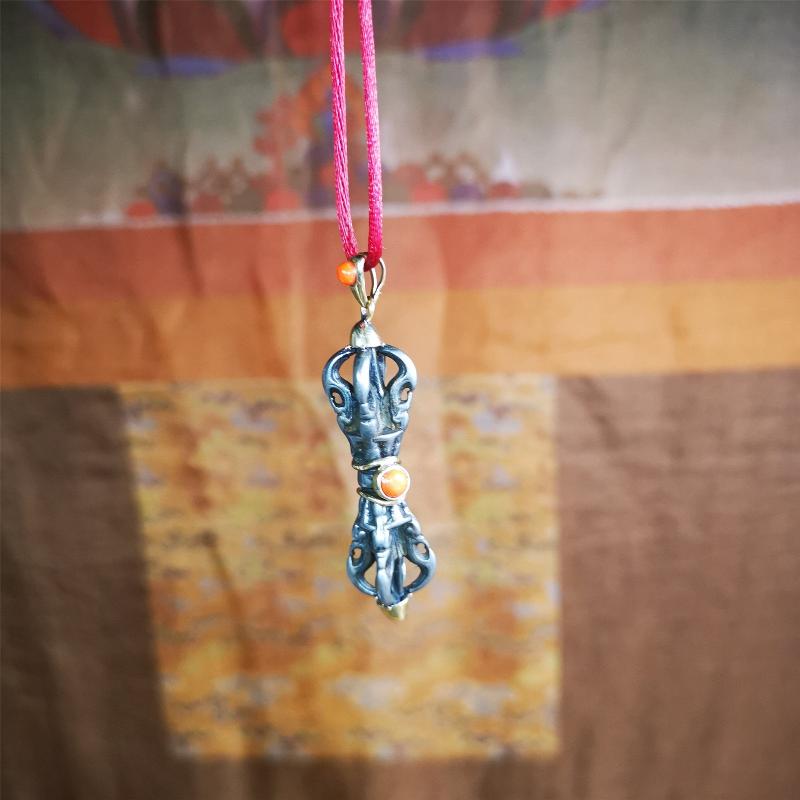 This unique vajra pendant was handmade by Tibetan craftsmen from Tibet in 1990's,from Hepo Town, Baiyu County, the birthplace of the famous Tibetan handicrafts. It is five-pronged Vajra,made of cold iron, 1.77 inch height.Comes with leather cord. You can make it a necklace, pendant, keychain, mala pendant, or just as an ornament on your desk.