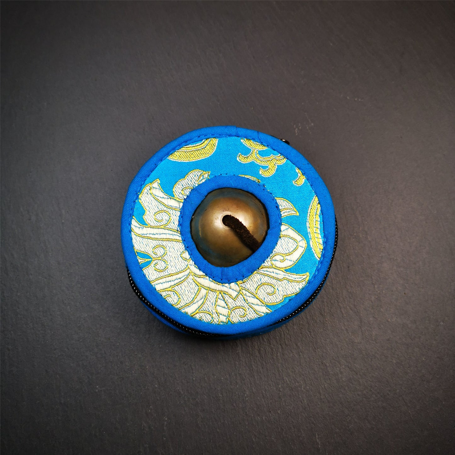 This tingsha bell set was handmade in Nepal,using traditional techniques and materials. It was made of copper,8.3cm diameter,with pure, clear and resonant,good for meditation. Come with tingsha case.