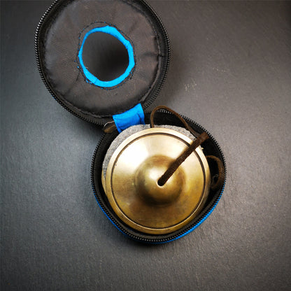 This tingsha bell set was handmade in Nepal,using traditional techniques and materials. It was made of copper,8.3cm diameter,with pure, clear and resonant,good for meditation. Come with tingsha case.