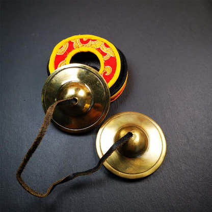 Brass Tingsha Set - Shiny Color - 2.6" - Tibetan Buddhist art, close-up detail