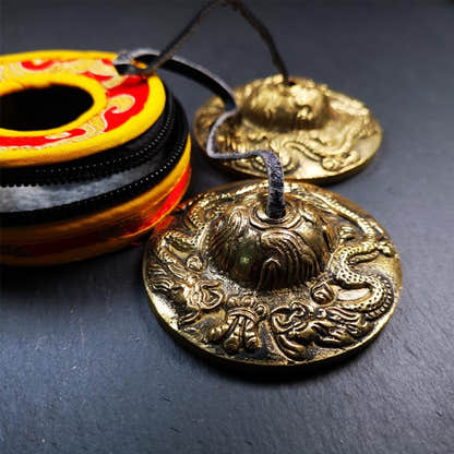 Brass Tingsha Set - Dragon - 2.6" - Tibetan Buddhist art, close-up detail