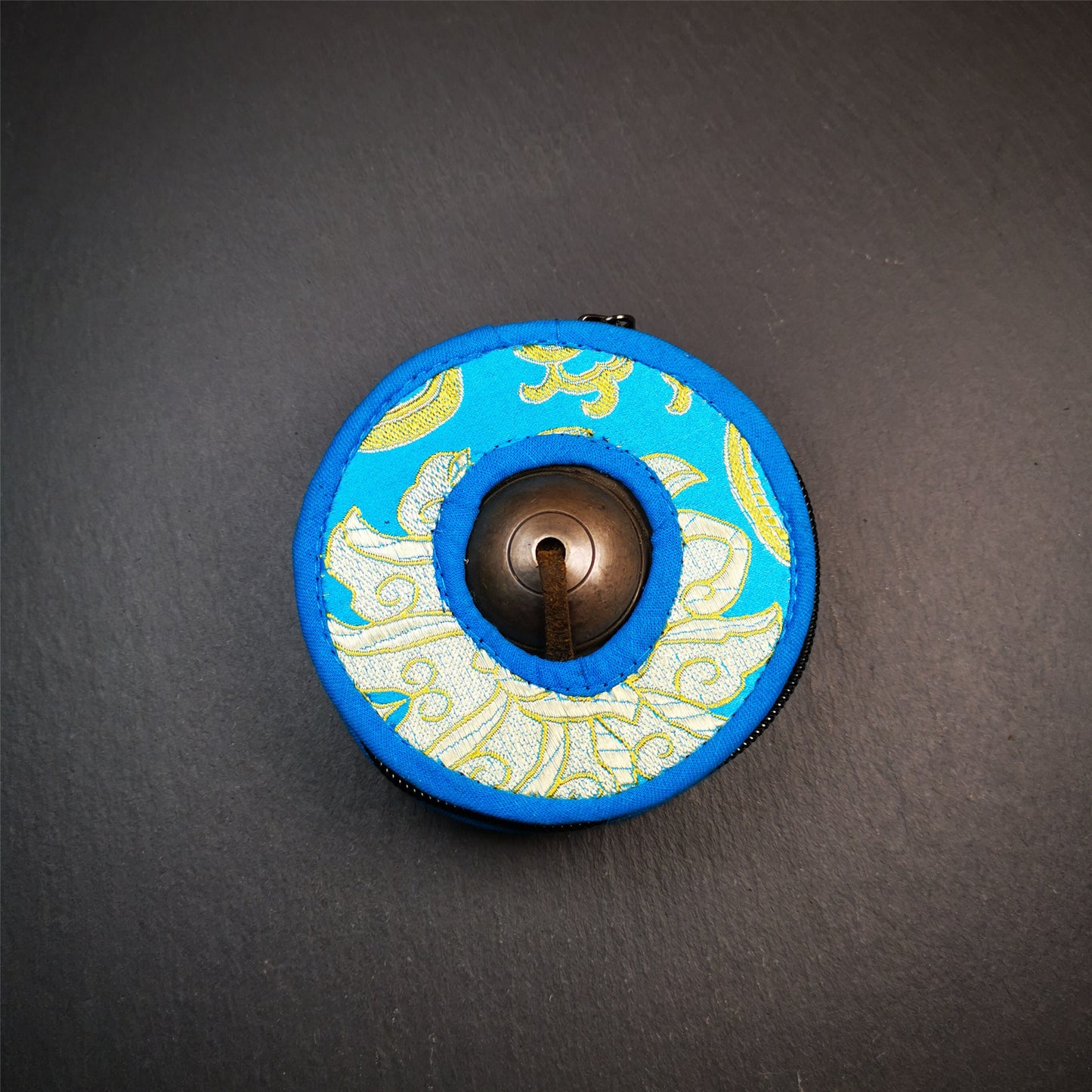 This tingsha bell set was handmade in Nepal,using traditional techniques and materials. It was made of bronze,special dark color,8.3cm diameter,with pure, clear and resonant,good for meditation. Come with tingsha case.