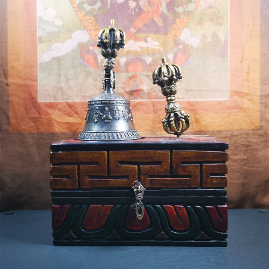 This vajra and bell set was handmade in Nepal,using traditional techniques and materials. The vajra is made of brass, the bell is made of bronze,carved mantra and other trantic buddhism patterns. The outer box is made of wood,carved manadala flower and traditional patterns.