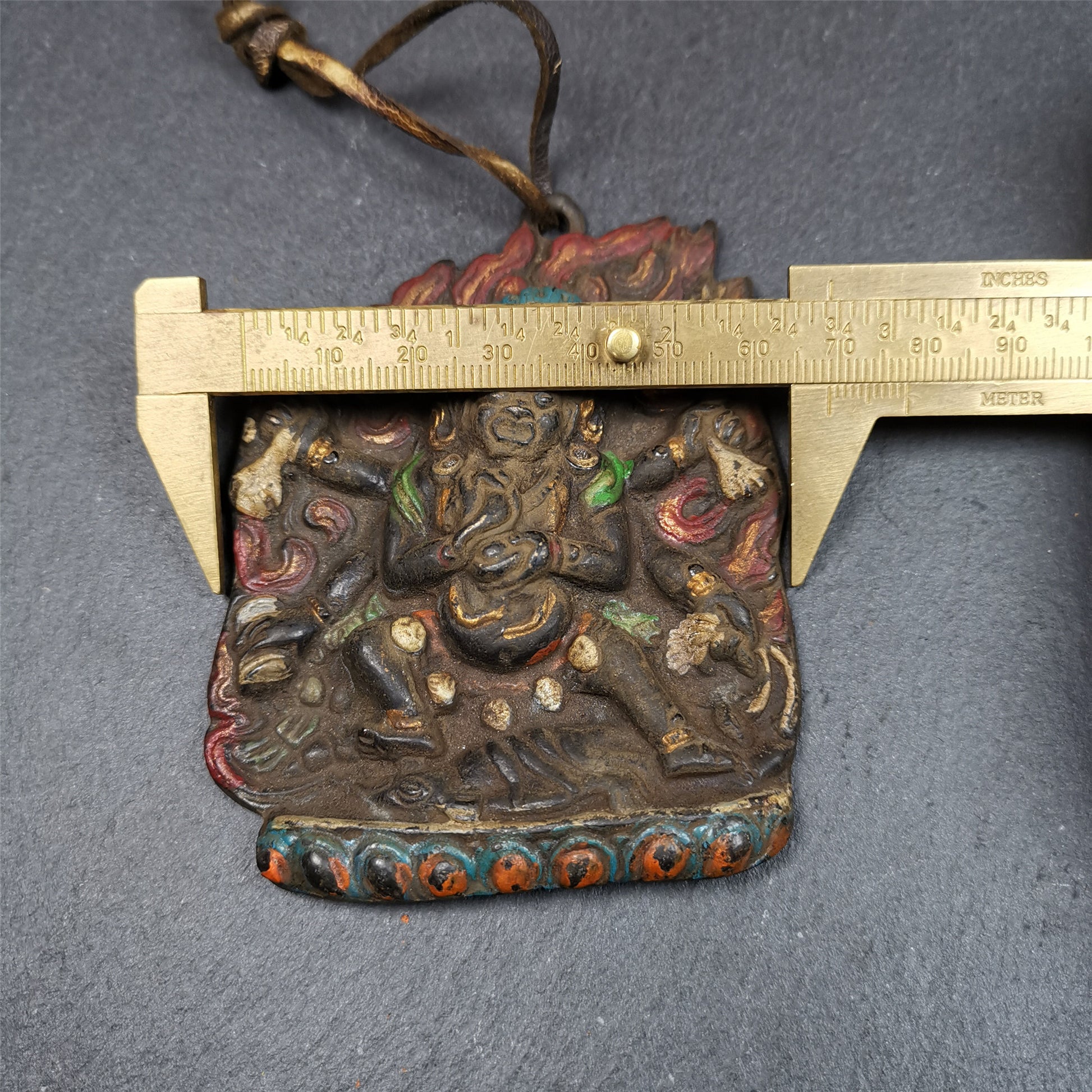 This Mahakala badge was collected from Jiegu Monastery,Tibet, about 40 years old. It is made of copper, painted with mineral pigments,height is 3.55 inches. Mahakala appears as a protector deity known as a dharmapala in Vajrayana Buddhism, particularly most Tibetan traditions as Citipati, and in Shingon Buddhism.