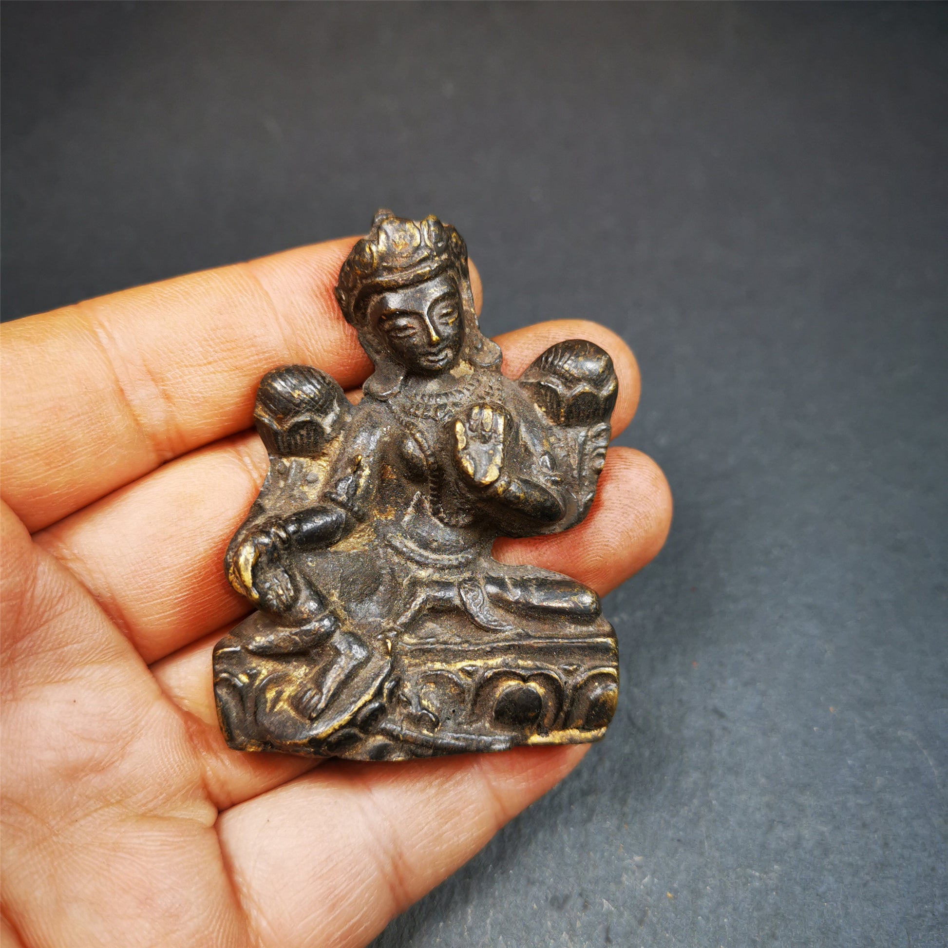 This is collect from Samyé Monastray, the first monastery in Tibet,and important Nyingma monsatery,about 60 years old. It's an old-fashioned green tara statue and painted with mineral pigments. Green Tara is associated with enlightened activity and active compassion, and is the manifestation from which all her other forms emanate.