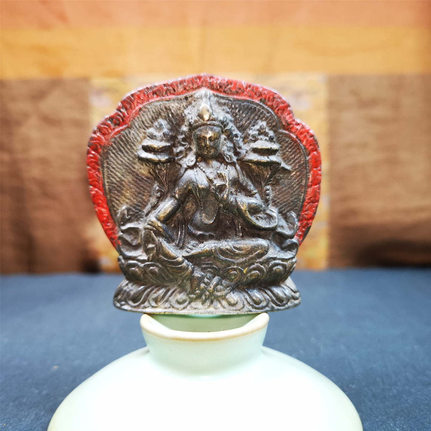 This small green tara statue was collect from Jiegu Monastray,about 80 years old. It's an old-style green tara statue,made of copper and painted with mineral pigments,size is about 2.16 by 1.97 inches. The back is carved mantra of Body, Speach,Mind