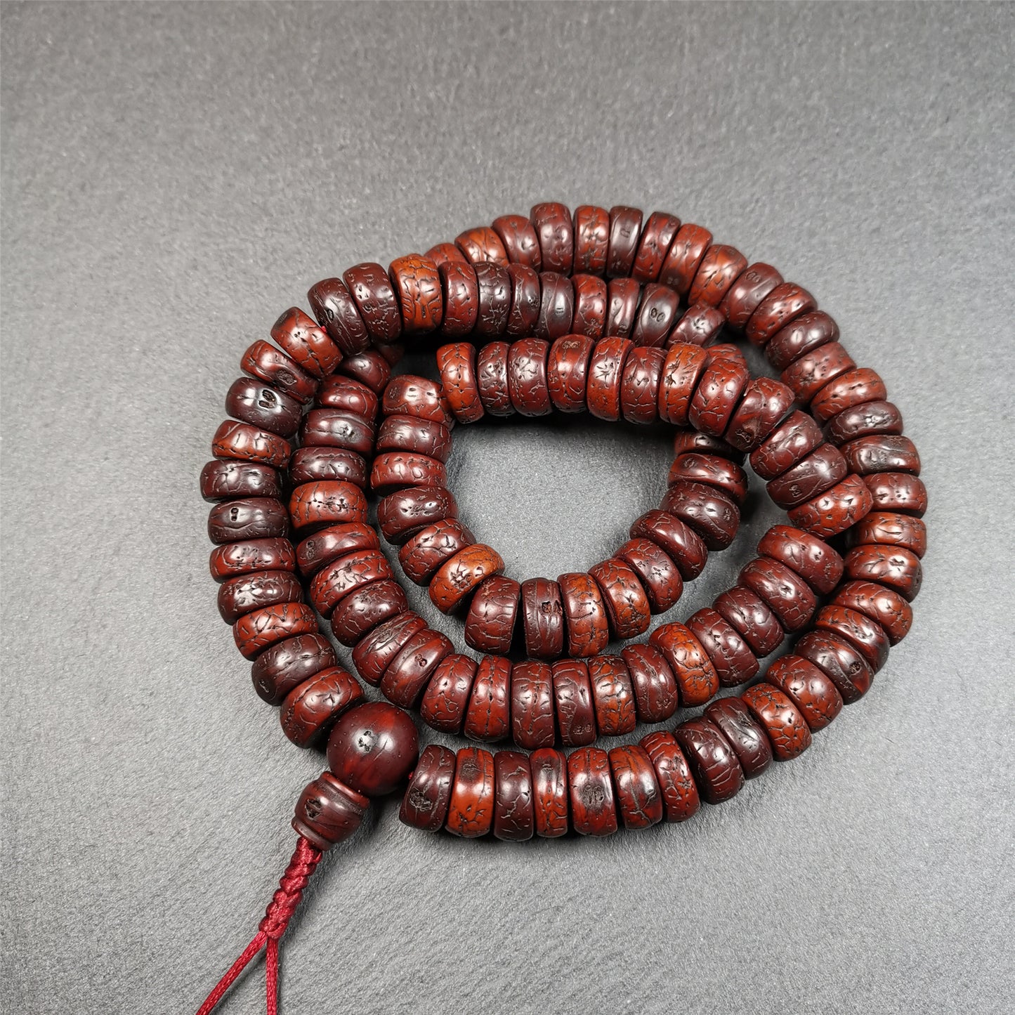 This bodhi seed mala was collected from Derge county,about 30 years old,hold and blessed by a lama. It is composed of 108 bodhi seed beads, bevel cut shape,brown color,approximately 13mm / 0.5 inch ,perimeter is about 70cm,27.5 inches.
