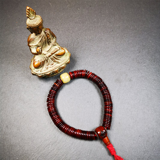This bone carved mala beads is made by Tibetan craftsmen and come from Hepo Town, Baiyu County. It has 108 flat shape beads,1 spacer bead,and 1 guru bead,all hand carved with tibetan yak bone.