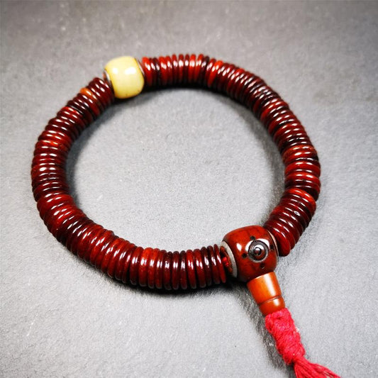 This bone carved mala beads is made by Tibetan craftsmen and come from Hepo Town, Baiyu County. It has 108 flat shape beads,1 spacer bead,and 1 guru bead,all hand carved with tibetan yak bone.