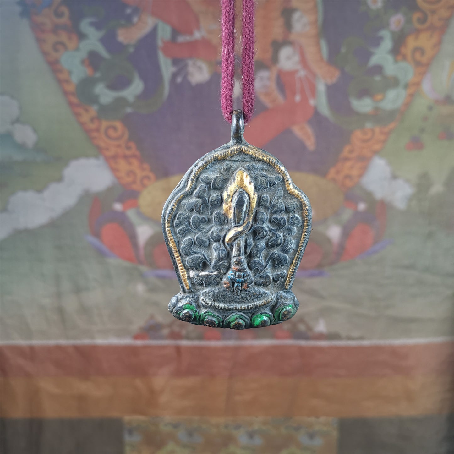 This Fire Sword amulet was collceted from gerze monastery, Tibet,about 30 years old. It's made of copper, a sword hangs on a lotus seat, surrounded by flames,painted mineral pigments.  You can carry it as a necklace,or pendant,or put into your shrine.