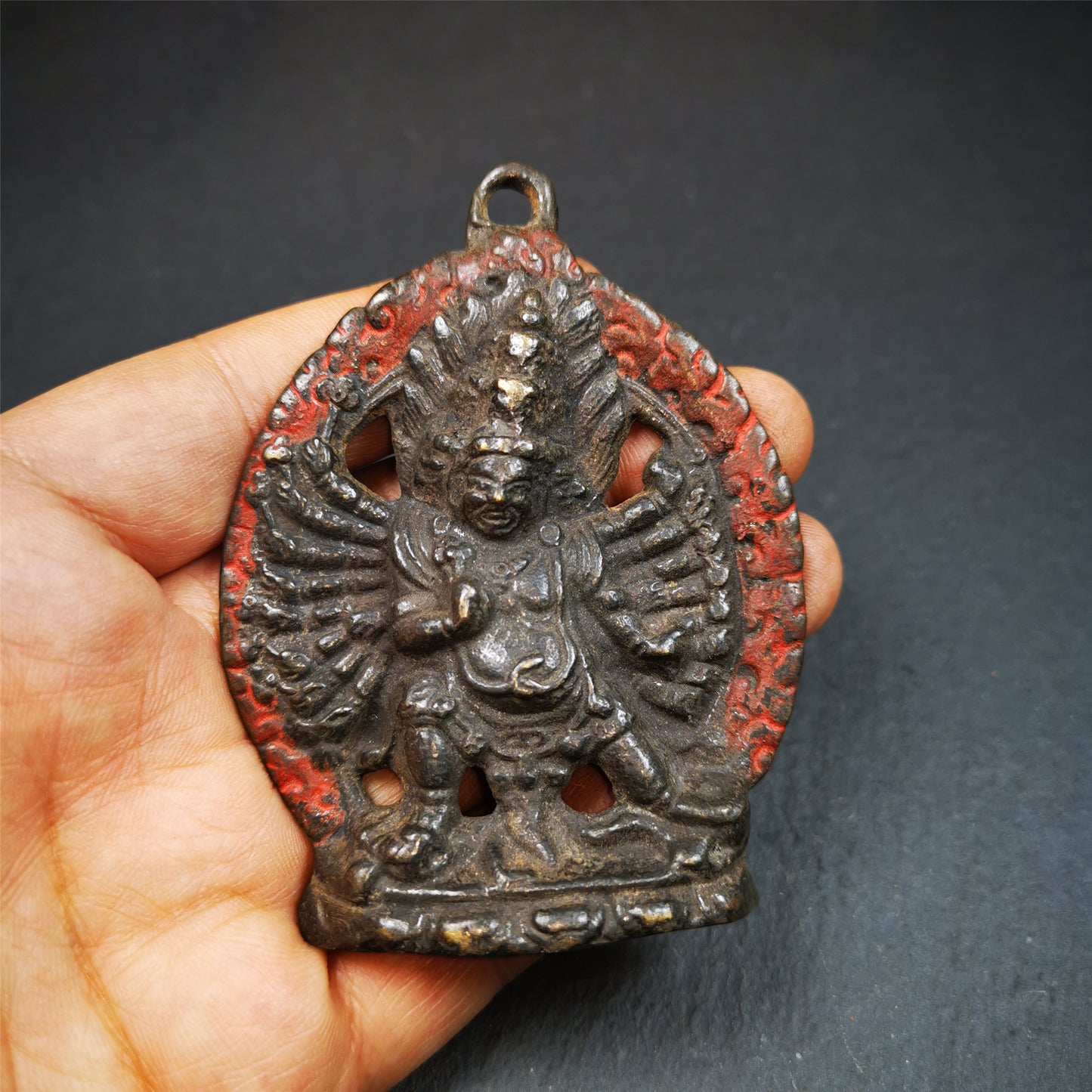 This old Yamantaka,Vajrabhairava statue was collected from gerze, Tibet. It is made of copper, paint with mineral pigments,size is 3.5 × 2.6 inches . You can make it as a amulet pendant, or put it into your shrine.