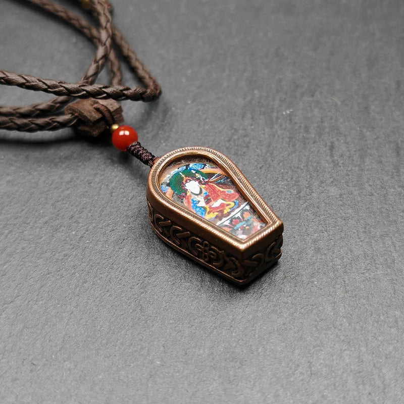 Gandhanra Antique Handmade Gau Ghau Shrine,Guru Rinpoche Gau Amulet, Mini Tibetan Buddhist Altar Amulet Pendant,Made of Red Copper,Handcrafted in the Baiyu county of Kham, Tibet, blessed in Kathok monastery.This exquisite Gau box features intricate designs and is lovingly converted into a necklace adorned with beautiful agate Buddha beads. 