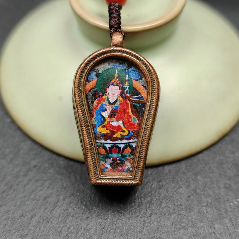 Gandhanra Antique Handmade Gau Ghau Shrine,Guru Rinpoche Gau Amulet, Mini Tibetan Buddhist Altar Amulet Pendant,Made of Red Copper,Handcrafted in the Baiyu county of Kham, Tibet, blessed in Kathok monastery.This exquisite Gau box features intricate designs and is lovingly converted into a necklace adorned with beautiful agate Buddha beads. 