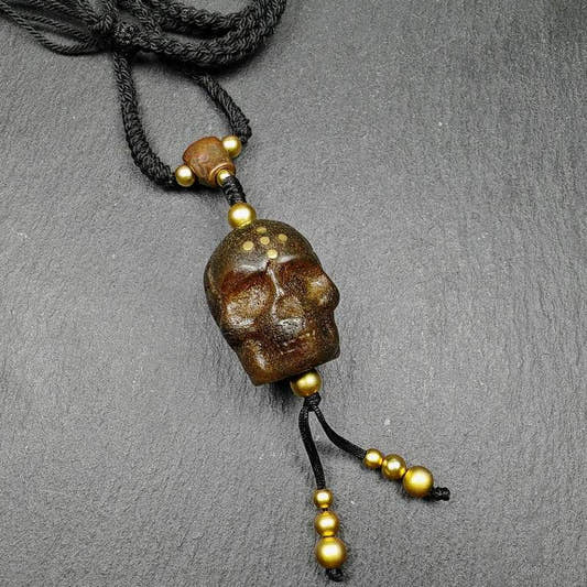 Amulet,Citipati Skull Charm - Tibetan Buddhist amulet, front view