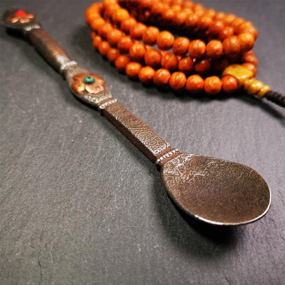 This offering spoon is handmade by Tibetan craftsmen from Hepo Town, Baiyu County,the birthplace of the famous Tibetan handicrafts. It is entirely hand-carved with cold iron and copper,lenght about 7.1 inches. You can see teh intricate engraved detail along the handle, neck and bowl,very beautiful. Religious dharma tool used in Buddhist shrine.