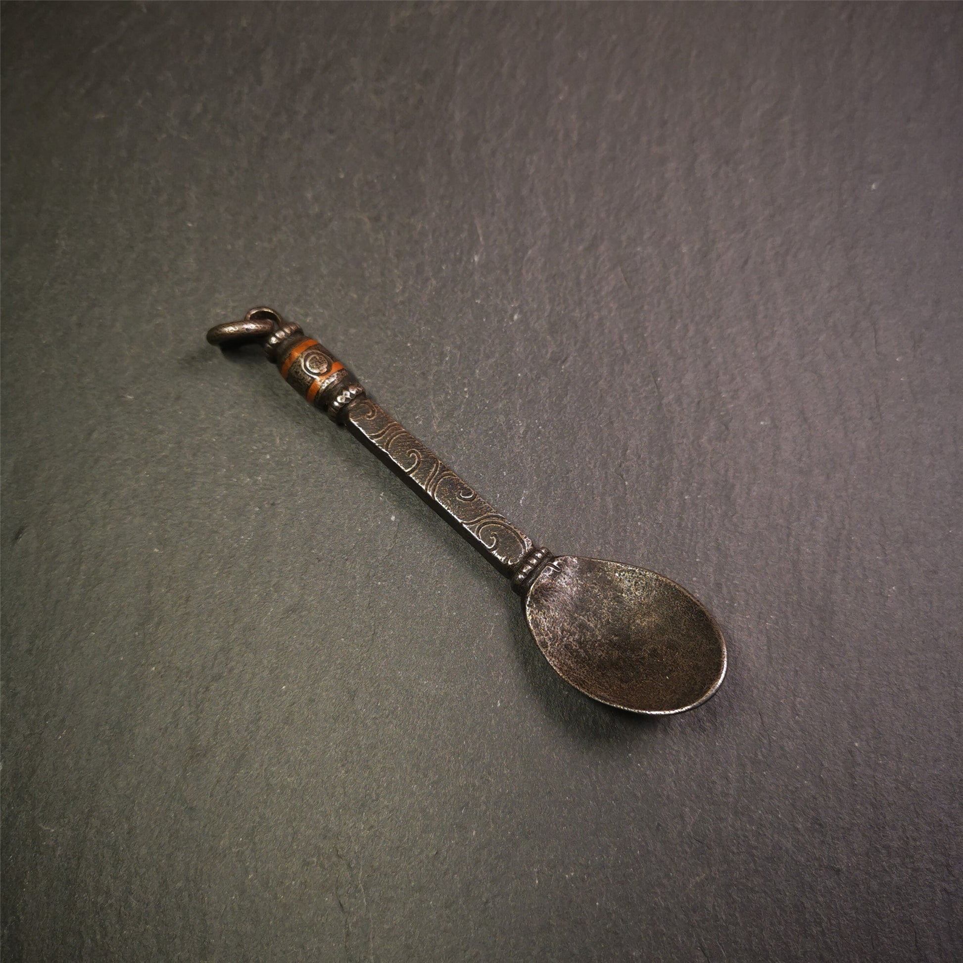 This offering spoon is handmade by Tibetan craftsmen from Hepo Town, Baiyu County,the birthplace of the famous Tibetan handicrafts. It is entirely hand-carved with cold iron and copper,lenght about 4.0 inches.