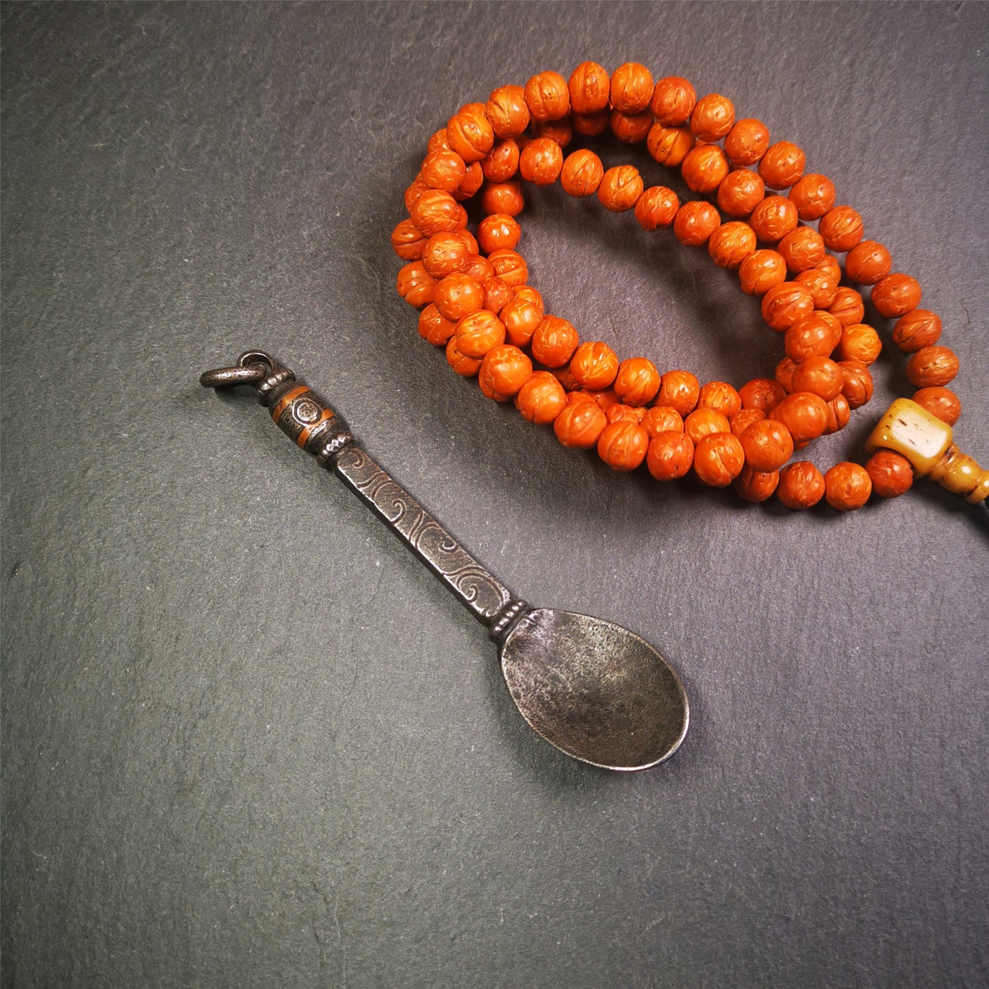 This offering spoon is handmade by Tibetan craftsmen from Hepo Town, Baiyu County,the birthplace of the famous Tibetan handicrafts. It is entirely hand-carved with cold iron and copper,lenght about 4.0 inches.