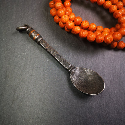 This offering spoon is handmade by Tibetan craftsmen from Hepo Town, Baiyu County,the birthplace of the famous Tibetan handicrafts. It is entirely hand-carved with cold iron and copper,lenght about 4.0 inches.