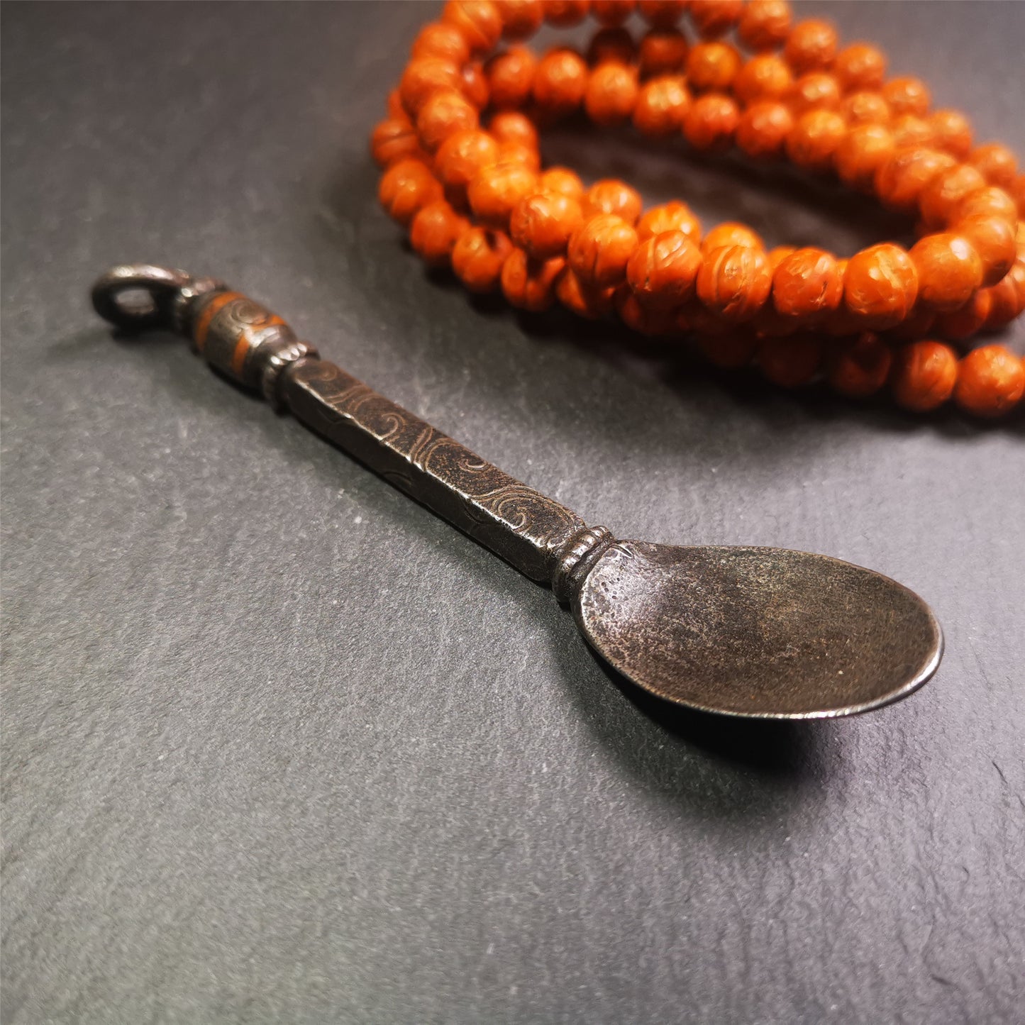 This offering spoon is handmade by Tibetan craftsmen from Hepo Town, Baiyu County,the birthplace of the famous Tibetan handicrafts. It is entirely hand-carved with cold iron and copper,lenght about 4.0 inches.