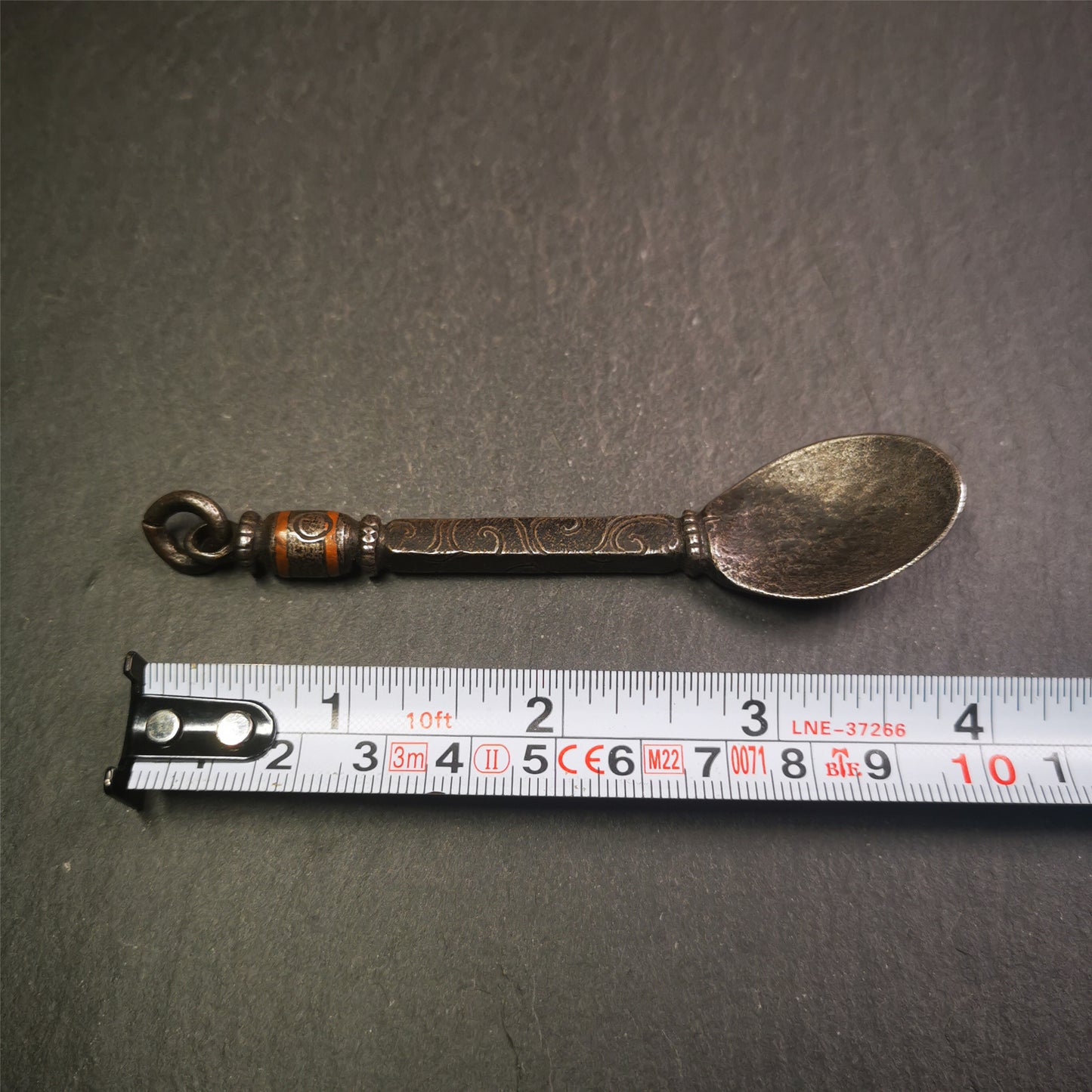 This offering spoon is handmade by Tibetan craftsmen from Hepo Town, Baiyu County,the birthplace of the famous Tibetan handicrafts. It is entirely hand-carved with cold iron and copper,lenght about 4.0 inches.