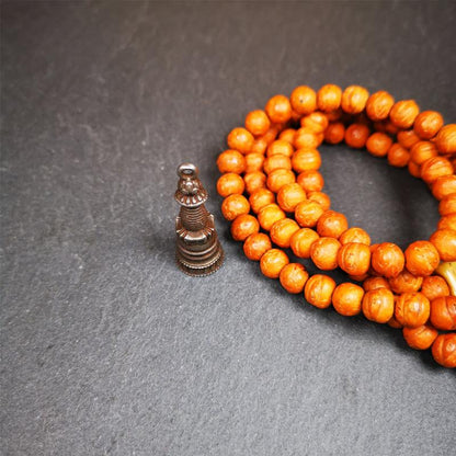 This beautiful stupa pendant is hand carved by Tibetan craftsmen from Tibet in 2000's. From Hepo Town, Baiyu County, the birthplace of the famous Tibetan handicrafts. It was made of cold iron,black color,1.38 inches height, a cross vajra seal at the bottom.  You can make it into a pendant, or a keychain, or put it in your shrine.