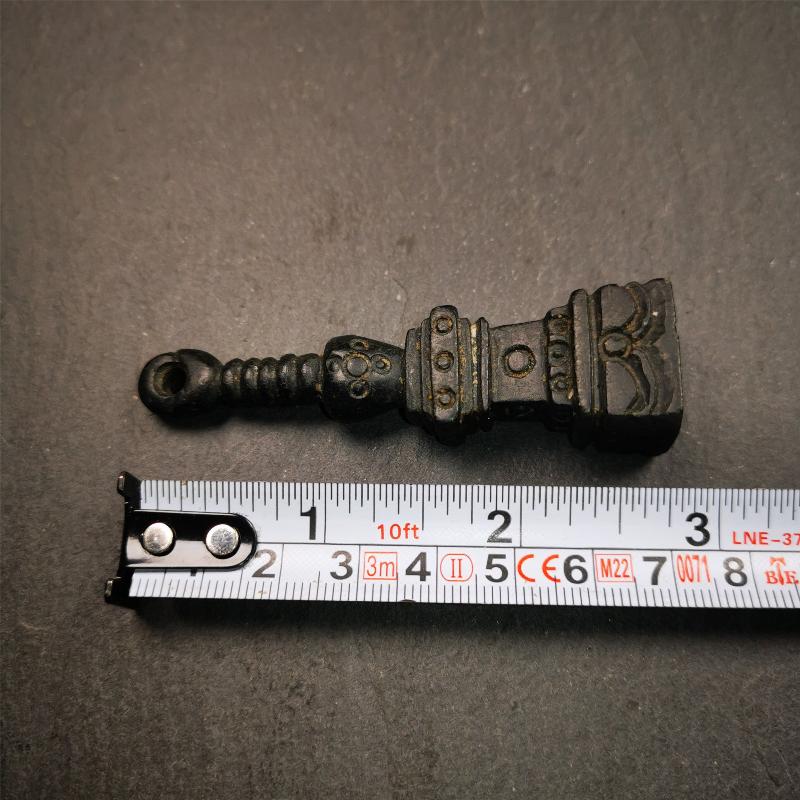 This beautiful stupa pendant is hand carved by Tibetan craftsmen from Tibet in 2000's. From Hepo Town, Baiyu County, the birthplace of the famous Tibetan handicrafts. It was made of obsidian, all black color,2.95 inches height. At the bottom of it is engraved with the Tibetan word OM.