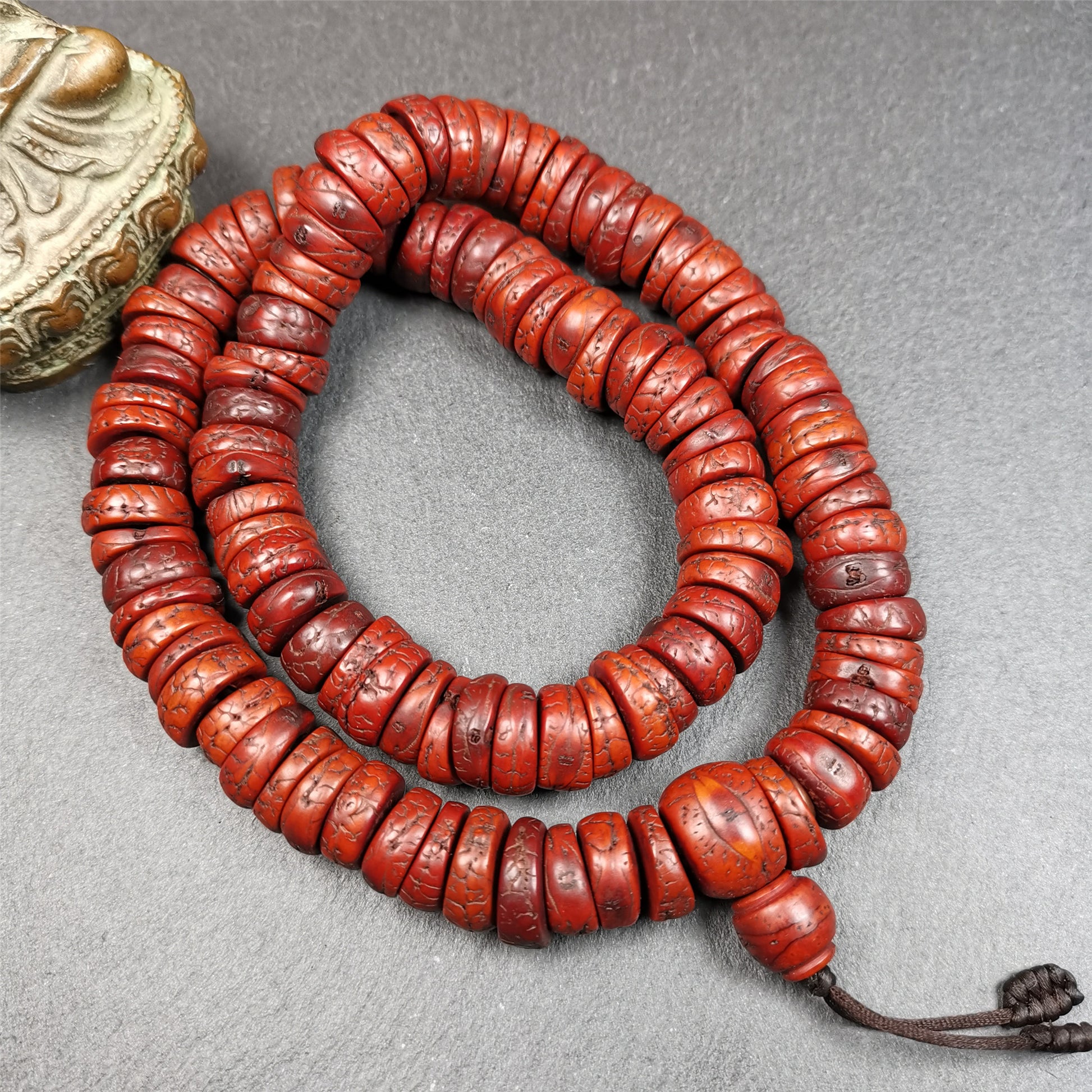 This bodhi bead mala is made by Tibetan craftsmen.  108 bodhi beads approximately 14mm / 0.55 inches,Mala'perimeter is about 44cm,17.3 inches. Each retaining the eye of the bodhi bead,very unique and elegant.