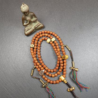 This bodhi beads mala is made by Tibetan craftsmen and come from Hepo Town, Baiyu County, the birthplace of the famous Tibetan handicrafts,about 30 years old, hold and blessed by a lama in Baiyu Monastery.  It is composed of 108 bodhi seed beads, and is equipped with 3 yak beads,copper bead counters are installed on both sides, 1 copper bead clip, 1 bone pendant bead,and finally consists a bone vajra on the end, very elegant.
