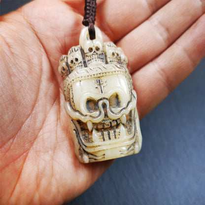 This beautiful bone skull amulet is hand carved by Tibetan craftsmen from Hepo Town, Baiyu County, the birthplace of the famous Tibetan handicrafts. It is Masters of Sitavana, entirely hand-carved of yak bone,wears a crown with 5 skulls,size is 2.3 inches,very beautiful. You can use it as a pendant, or bag hanging,or put it into your shrin