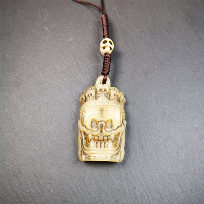 This beautiful bone skull amulet is hand carved by Tibetan craftsmen from Hepo Town, Baiyu County, the birthplace of the famous Tibetan handicrafts. It is Masters of Sitavana, entirely hand-carved of yak bone,wears a crown with 5 skulls,size is 2.3 inches,very beautiful. You can use it as a pendant, or bag hanging,or put it into your shrin