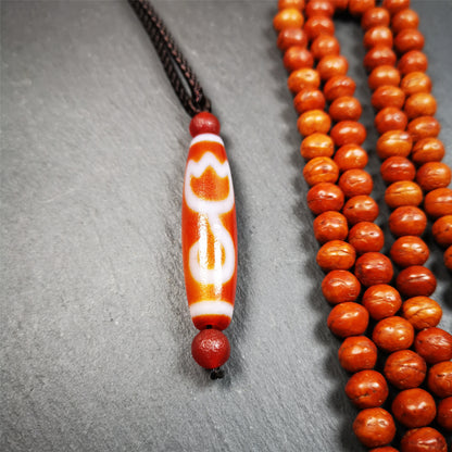 This vintage Lotus Dzi Bead is made of fire agate,new but high quality,size is 1.9" × 0.5". The lotus is the symbol of what is divine or immortal in humanity, and is also a symbol of divine perfection. The lotus is the attribute of sun and fire gods.