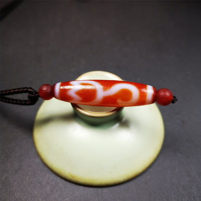 This vintage Lotus Dzi Bead is made of fire agate,new but high quality,size is 1.9" × 0.5". The lotus is the symbol of what is divine or immortal in humanity, and is also a symbol of divine perfection. The lotus is the attribute of sun and fire gods.