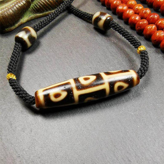 9 Eyed Bodhi Dzi Bead Necklace - Tibetan Buddhist bead necklace, detailed view