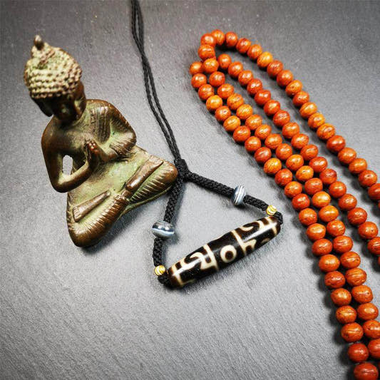 Guru Rinpoche's Ritual Paraphernalia Dzi Bead Necklace - Tibetan Buddhist bead necklace, front view