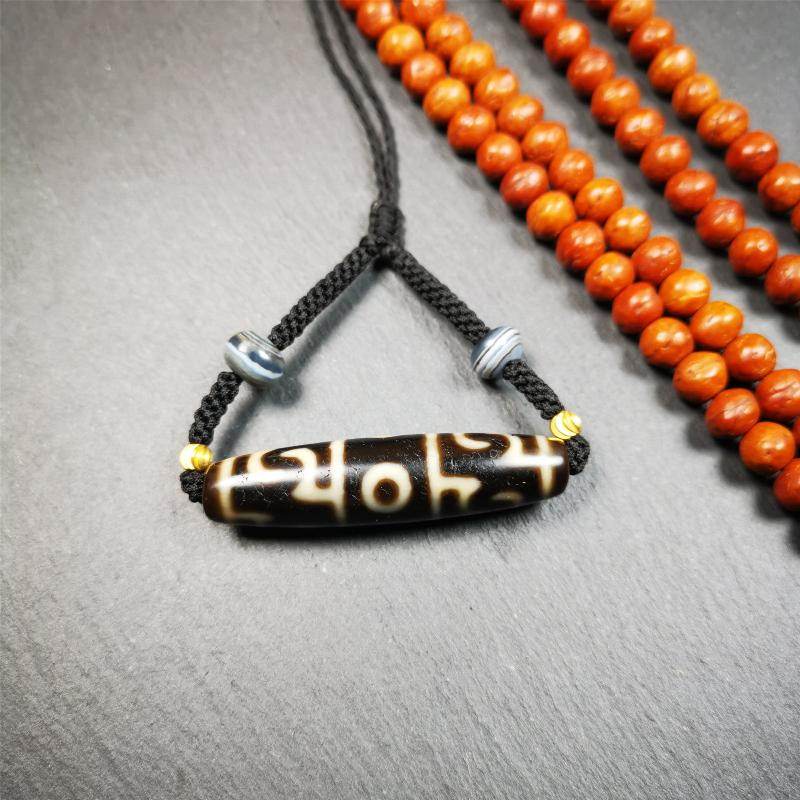 Guru Rinpoche's Ritual Paraphernalia Dzi Bead Necklace - Tibetan Buddhist bead necklace, close-up detail