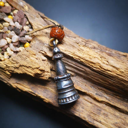 This beautiful stupa pendant is hand carved by Tibetan craftsmen from Tibet in 2000's. From Hepo Town, Baiyu County, the birthplace of the famous Tibetan handicrafts. It was made of cold iron,black color,1.38 inches height, a cross vajra seal at the bottom.  You can make it into a pendant, or a keychain, or put it in your shrine.