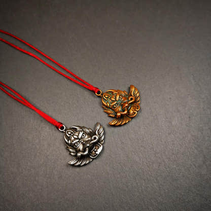Garuda Amulet 1.37" - Tibetan Buddhist amulet, detailed view