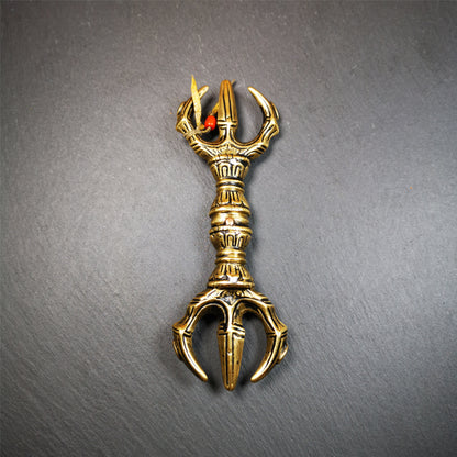 This unique vajra pendant was handmade by Tibetan craftsmen from Tibet in 2000's,from Hepo Town, Baiyu County, the birthplace of the famous Tibetan handicrafts. It is unique flat three - pronged Vajra,made of brass, yellow color,6.3 inches length. In tantric Buddhist practice, the vajra is a potent instrument with multifaceted meaning, symbolizing the adamantine state of existence of a Buddhist practitioner who has reached full enlightenment. The vajra is the archetypal symbol of tantric Buddhism.