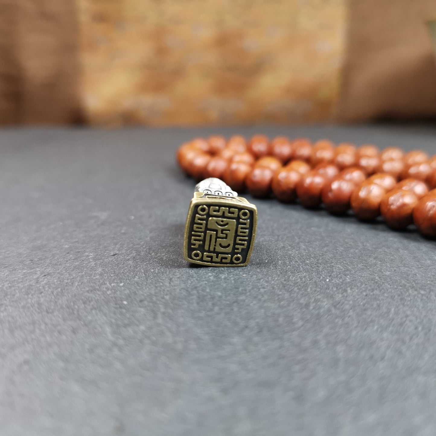 This tibetan snow lion seal was handmade from tibetan craftman. It is made of silver and brass,carved snow lion on the top and the Swastika symbol seal on the bottom,size is 0.9 inches.