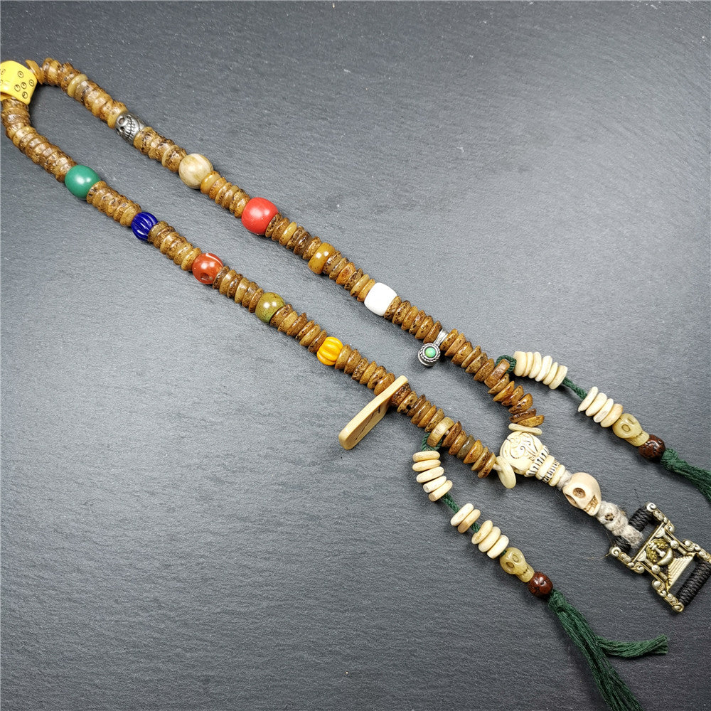 Gandhanra Authentic Tibetan Kapala Mala Necklace,Old Skull Bone Prayer Bead.This kapala mala was collected from Nyingma Kathok monastery, and has been passed down since the 1970's,used and blessed by lamas.
It's made according to traditional rituals, and accessories are gradually added,collection level.