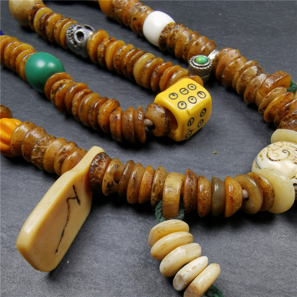 Gandhanra Authentic Tibetan Kapala Mala Necklace,Old Skull Bone Prayer Bead.This kapala mala was collected from Nyingma Kathok monastery, and has been passed down since the 1970's,used and blessed by lamas.
It's made according to traditional rituals, and accessories are gradually added,collection level.